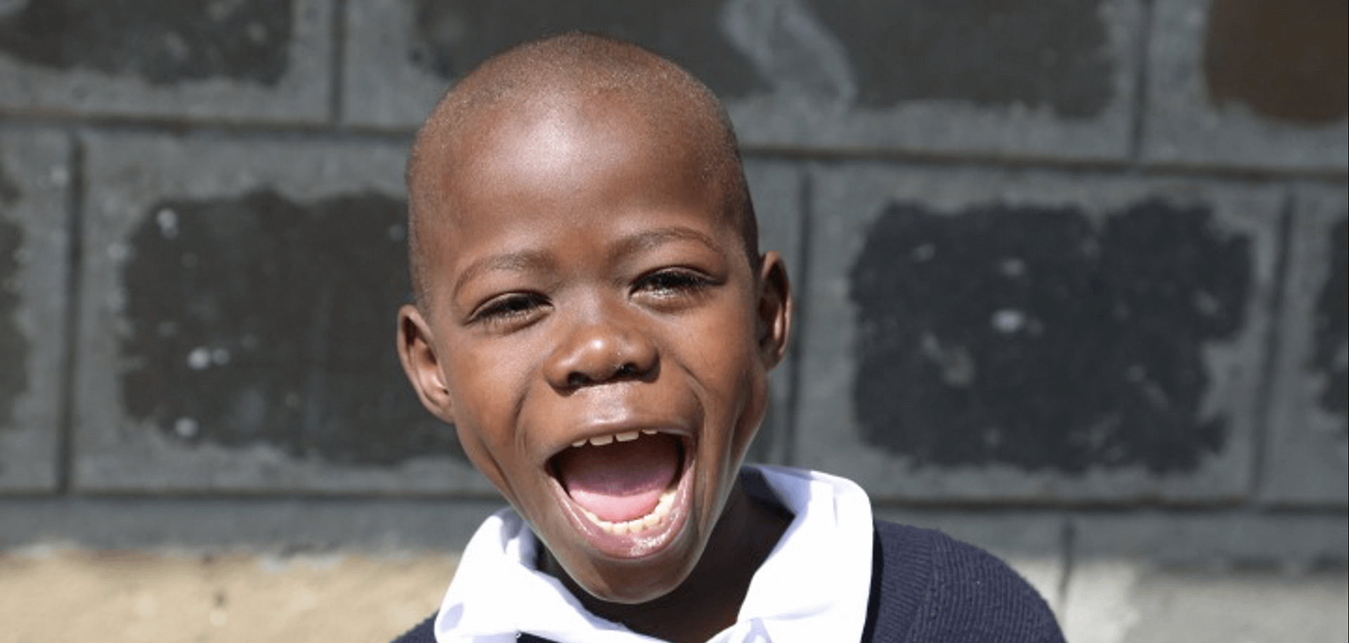 African boy with a large smile!